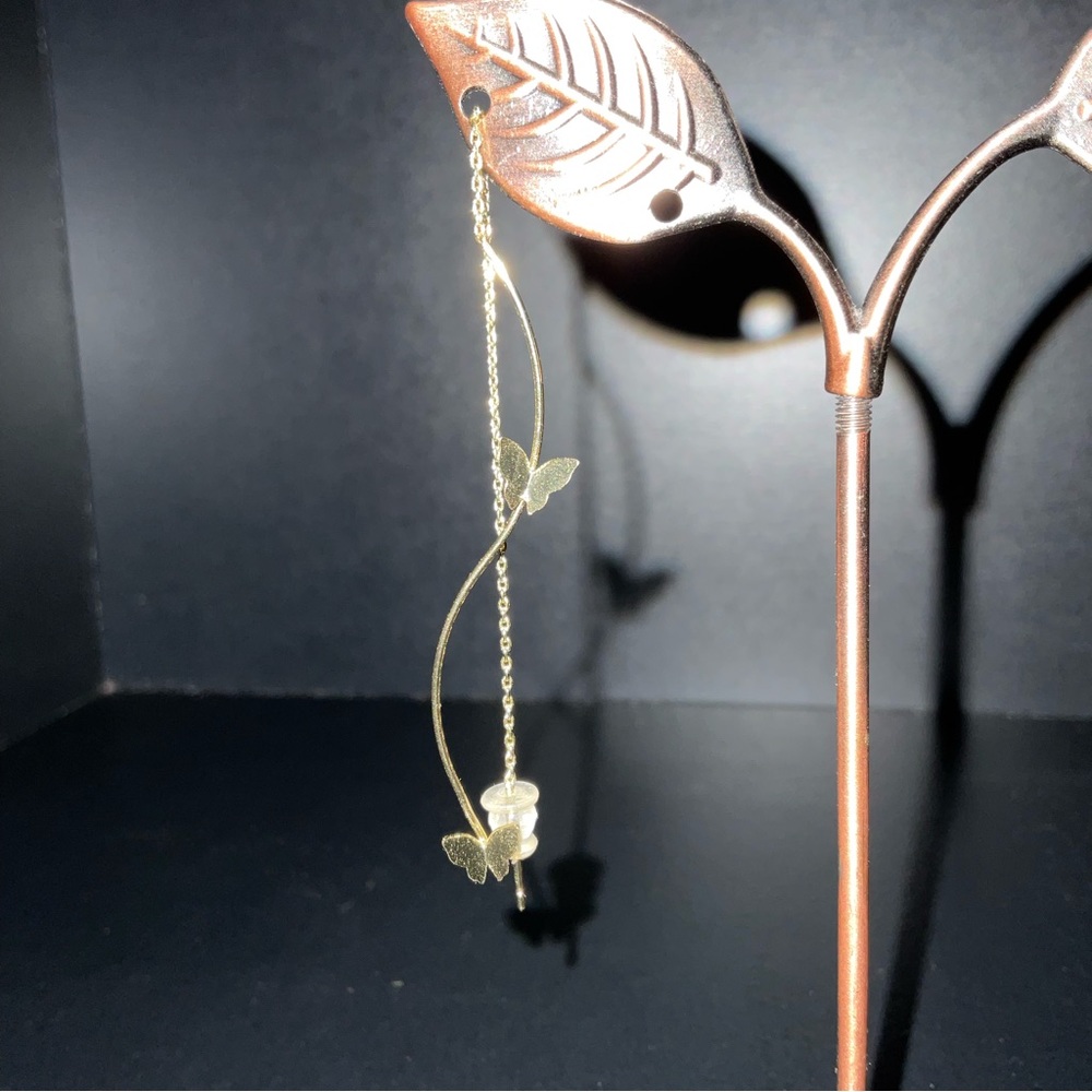 Thread in gold butterfly earrings